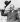 A courteous gentleman tipping his hat in a black and white era of yesteryear