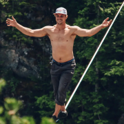 Man tightrope walking from Untethered