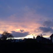 A photograph of the night sky as the sun sets