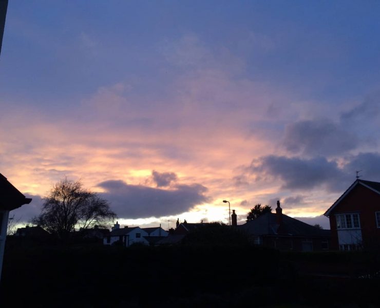 A photograph of the night sky as the sun sets