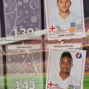 An Euro 2016 stcker album featuring England players Adam Lallana and Raheem Sterling