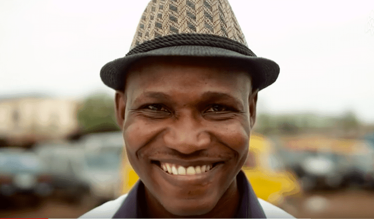 The world scrabble champion Wellington Jighere looks into the camera