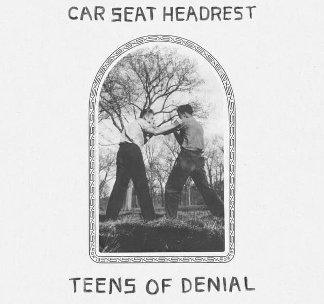 The album cover for teens of denial by Car Seat Headrest, featuring a black and white photo of two teens fighting