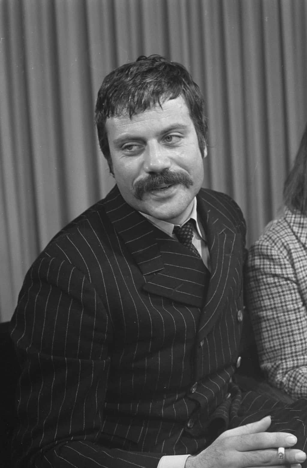 Actor, Oliver Reed, had to make a decision whether to keep his