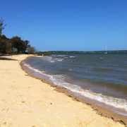 A deserted shore line of a beach