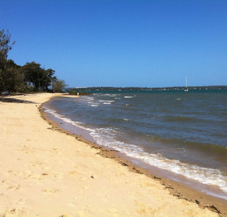 A deserted shore line of a beach