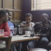Men sat in a pub in short film What Men Fear Most