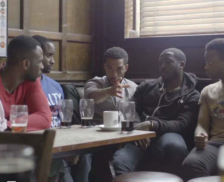 Men sat in a pub in short film What Men Fear Most