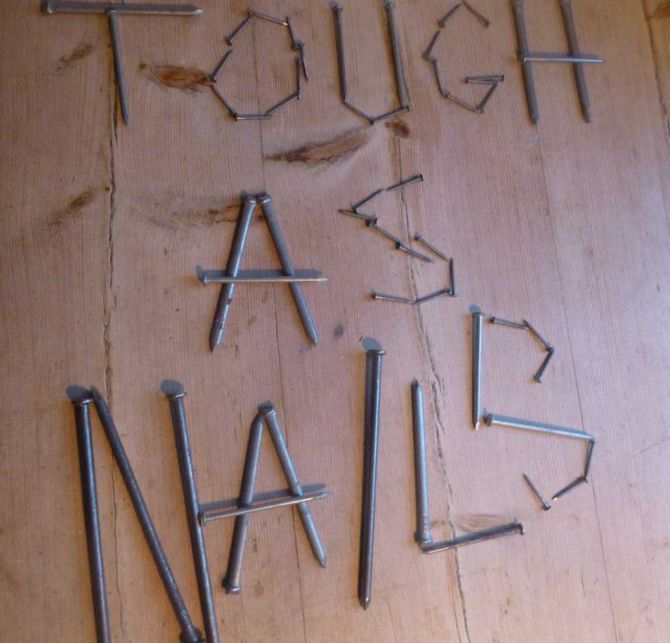 Tough as Nails sportsmen written in nails