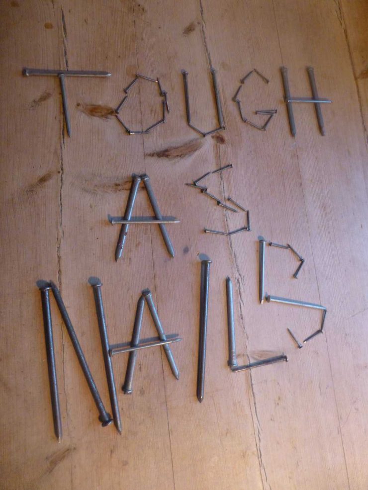 Tough as Nails sportsmen written in nails