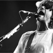 Nirvana's Kurt Cobain screaming into a microphone