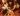 Jennifer Laurence on the poster for the first Hunger Games Film. He holds a bow and arrow in one hand. The words The Real have been added to the poster above the words Hunger Games