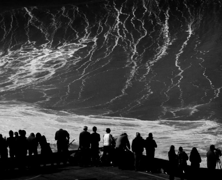 Photographers watching huge wave