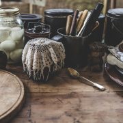 Cutlery and condiments on a wooden table