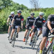 Five cyclists take a corner during Bristol's Great Western Ride one of the best cycling events in Britain
