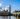 The Palace Of Westminster with Big Ben in centre of shot. Taken from opposite side of Thames