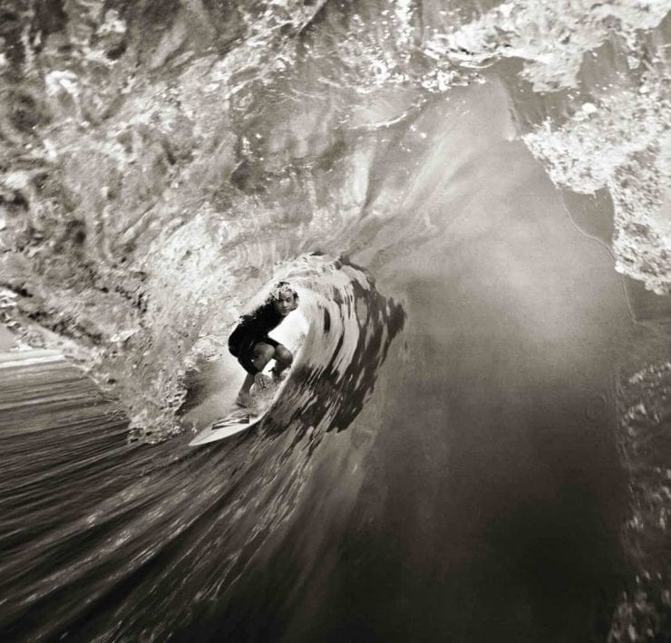 Surfer in barrel by surf photographer Chris Bickford