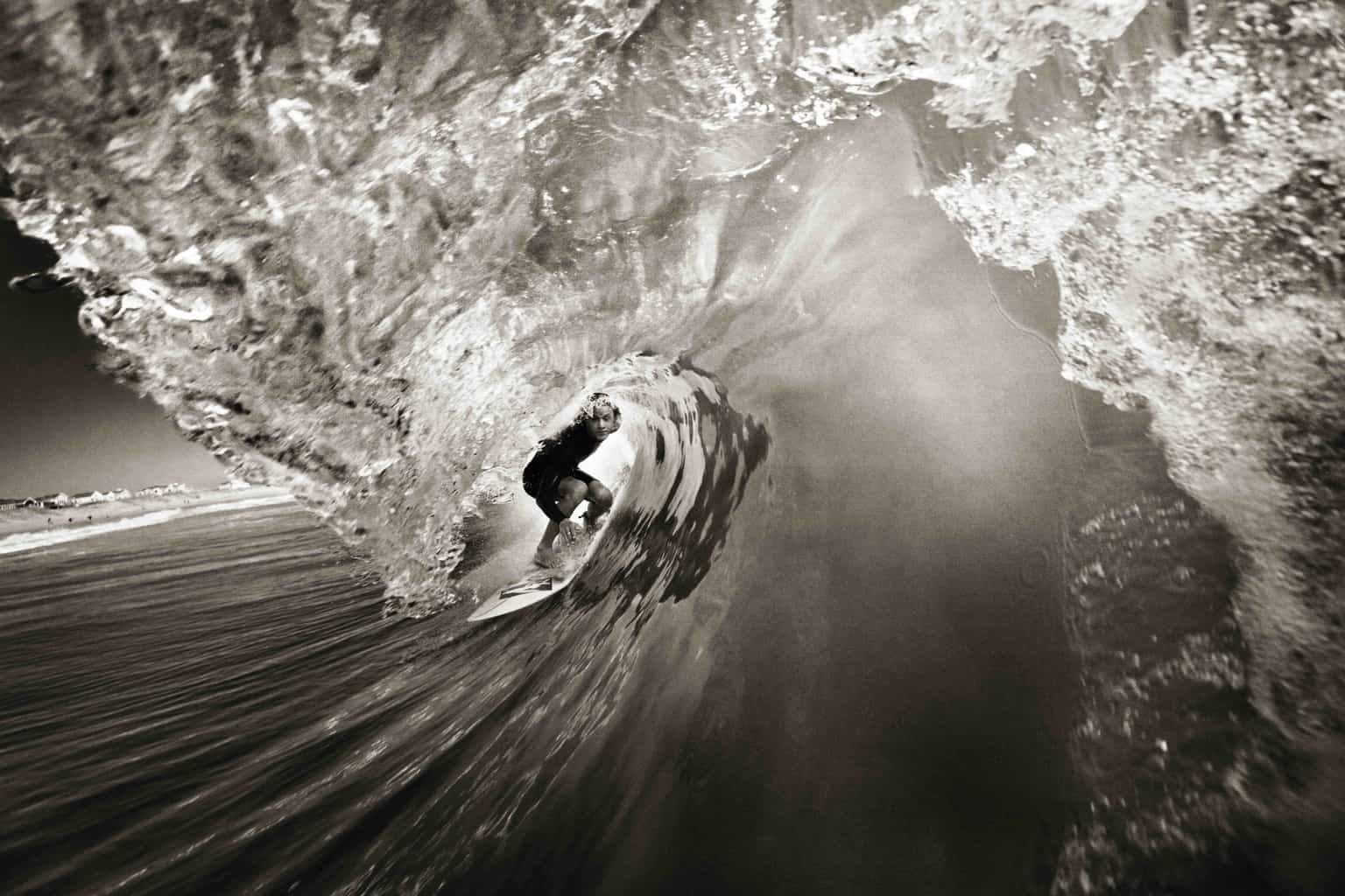 Surfer in barrel by surf photographer Chris Bickford