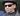 Goodfellas star Joe Pesci wearing shades and a pork pie hat
