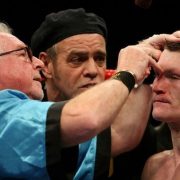 Cuts man Mick Williamson works on Ricky Hatton's cut eye