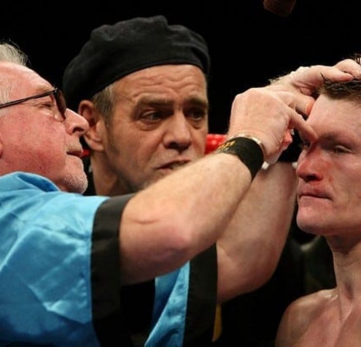 Cuts man Mick Williamson works on Ricky Hatton's cut eye