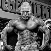 Barny Du Pledsis flexing muscles topless