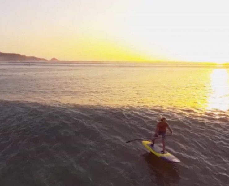 Laird Hamilton riding a big wave