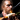 Man from vegetable orchastra 'playing' a carrot