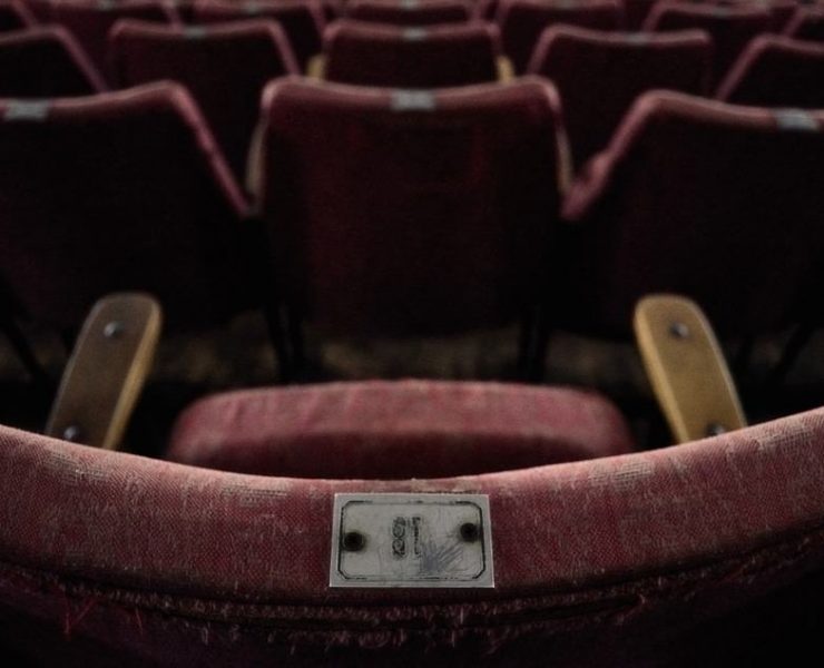 A worn out old cinema chair
