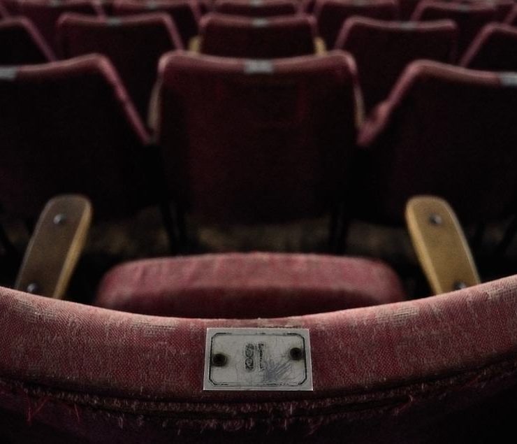 A worn out old cinema chair