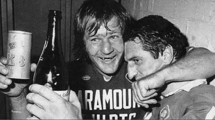 Tommy Raudonikis celebrates with beer