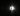 The silhouette of a man in a dark tunnel walking towards the light