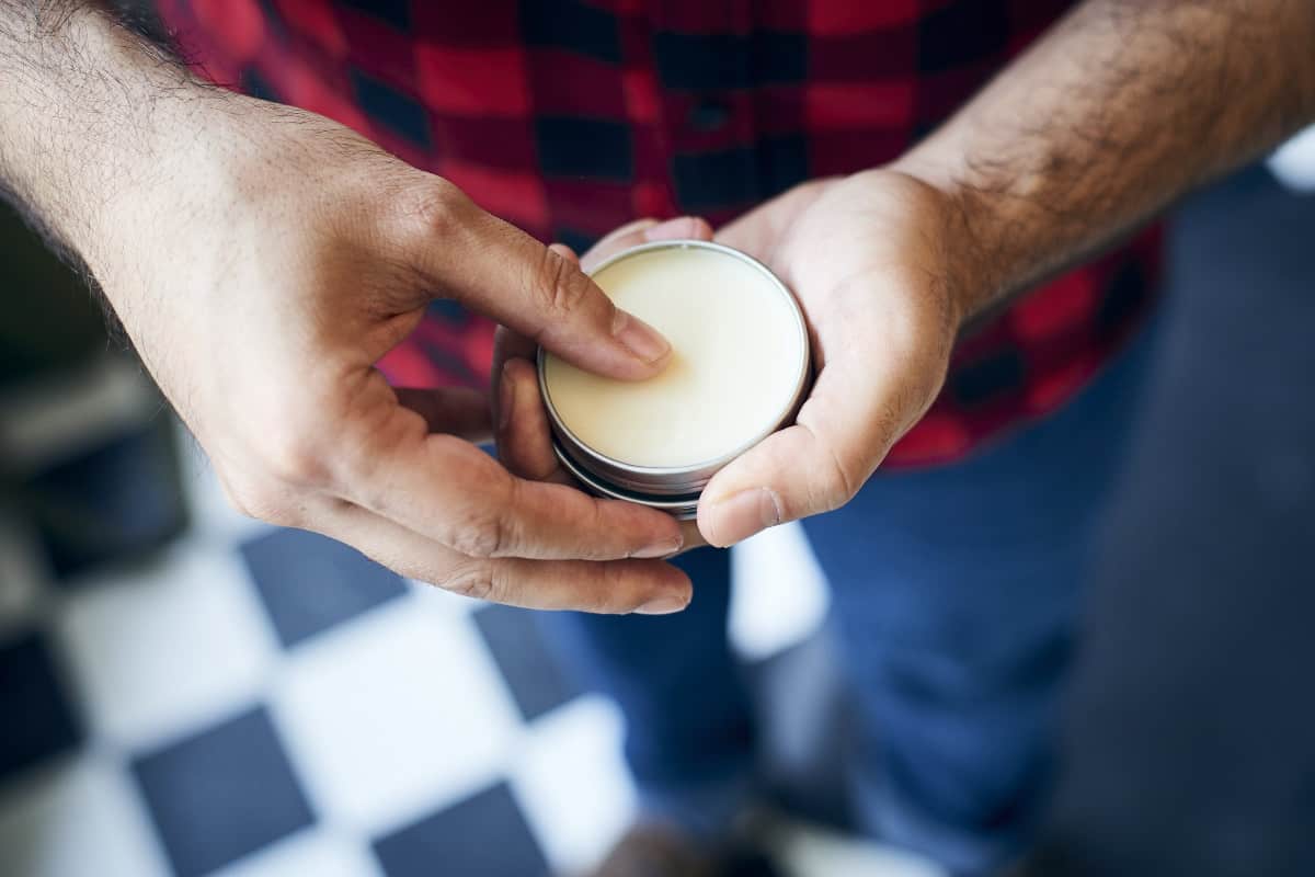 Man holding beard balm