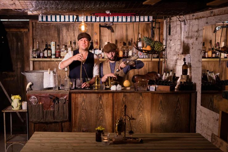 Chris Edwards & Dave Tregenza making winter cocktails behind a bar