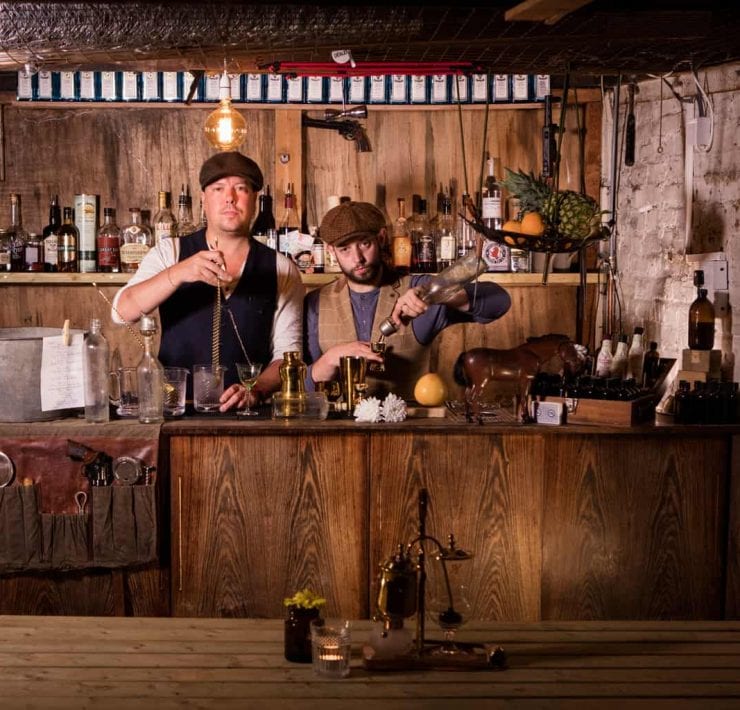 Chris Edwards & Dave Tregenza making winter cocktails behind a bar