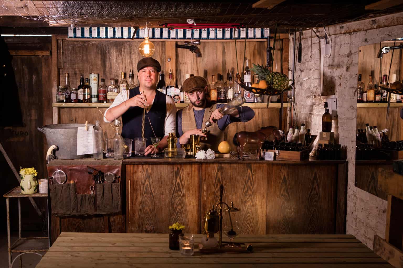 Chris Edwards & Dave Tregenza making winter cocktails behind a bar