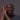 Frank Bruno staring at the camera hands clasped