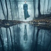 A ghostly figure of a woman hovers above a lake from film The Lodgers filmed at Loftus Hall