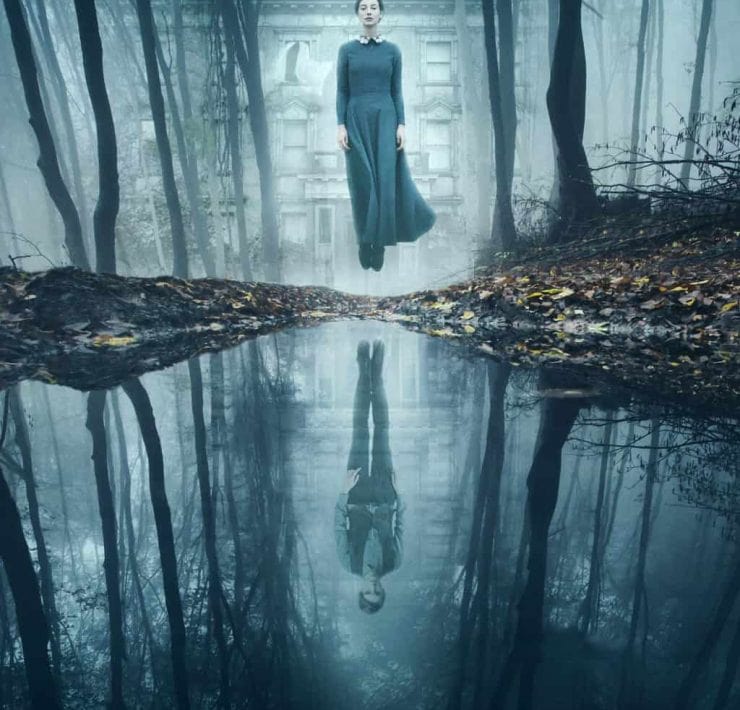 A ghostly figure of a woman hovers above a lake from film The Lodgers filmed at Loftus Hall