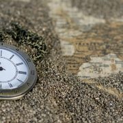 pocket watch on sand