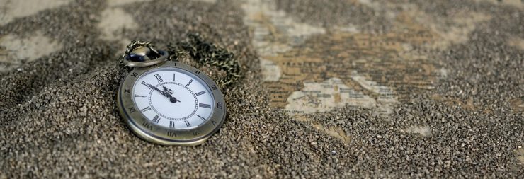 pocket watch on sand