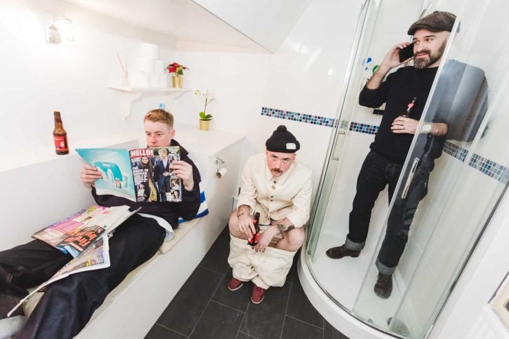 The ULLAC denim boys pictured in a bathroom
