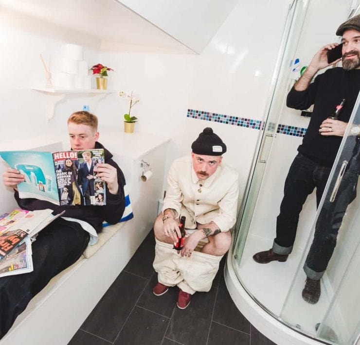 The ULLAC denim boys pictured in a bathroom