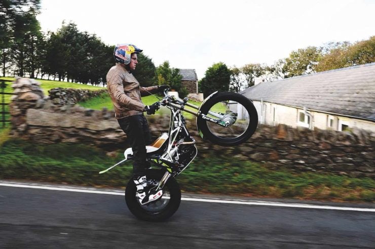 Dougie Lampkin attempting to wheelie full TT Course