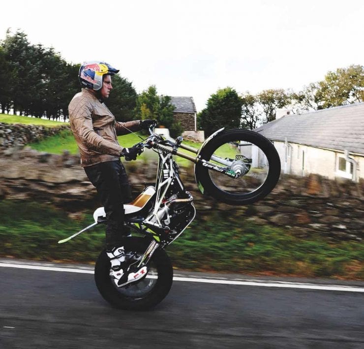 Dougie Lampkin attempting to wheelie full TT Course