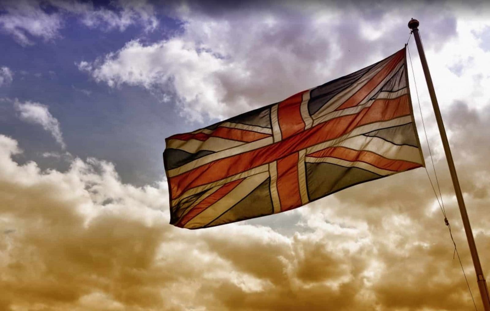 Union Jack against a cloudy sky