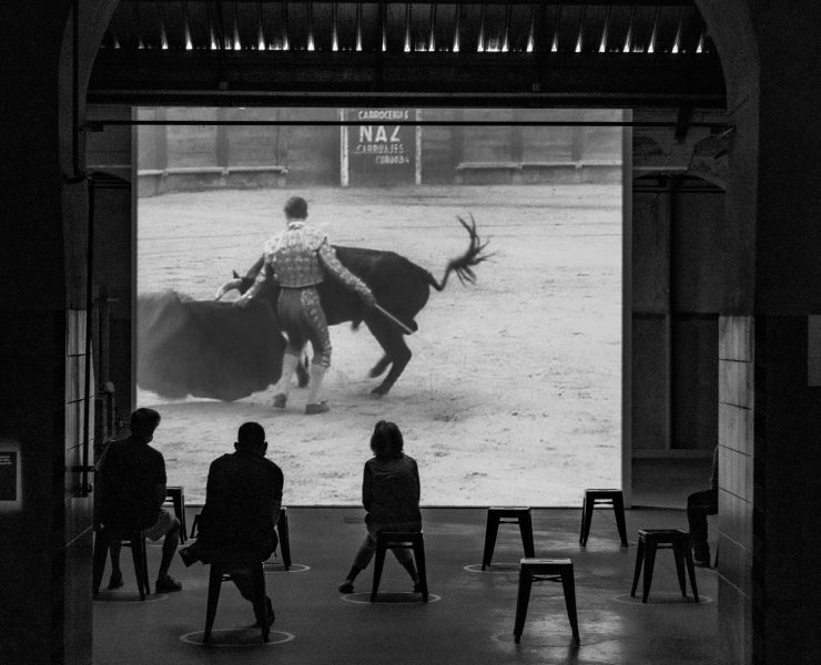 watching footinge of a bullfighter on a screen