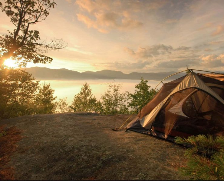 Camping scene by lake