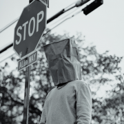 man with paper bag on his head