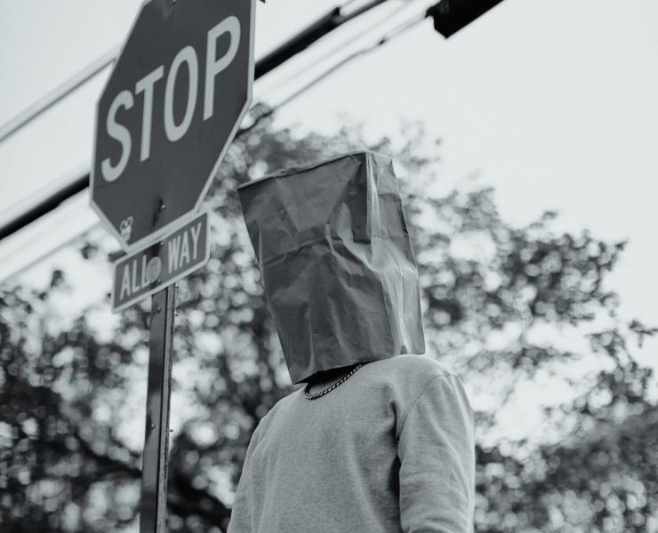 man with paper bag on his head